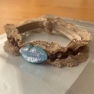 🚨10/20🚨 NWOT Original bracelet with lips